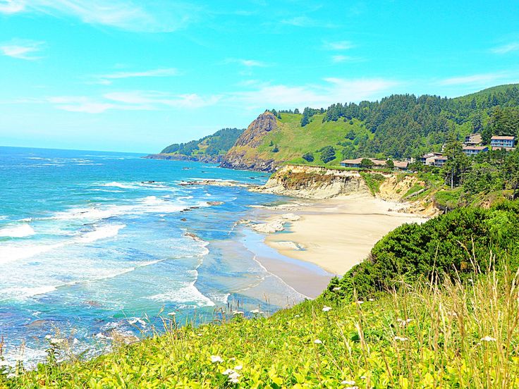 a scenic view of the beach and ocean