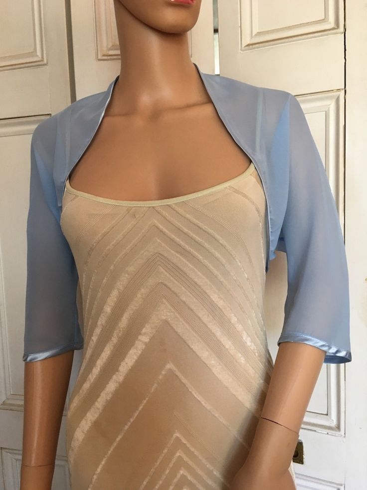 This is a beautiful hand made light blue shrug ideal for weddings or special occasions. It can also be worn with casual wear. It can be made in any size from 8 to 24 (UK sizes). It is made in the UK. It is normally sent out to you within 5 days, but I am very happy to make your order a priority if you need it urgently. Just let me know the date needed by. Postage is free in the UK! International postage is £9. I am happy to exchange items or refund your payment if you are less than happy with th Fitted Blue Shrug For Spring, Elegant Fitted Summer Shrug, Fitted Open Front Shrug For Party, Spring Formal Fitted Shrug, Elegant Stretch Shrug For Spring, Elegant Fitted Shrug With Open Front, Elegant Stretch Open Front Shrug, Elegant Fitted Open Front Shrug, Blue Shrug