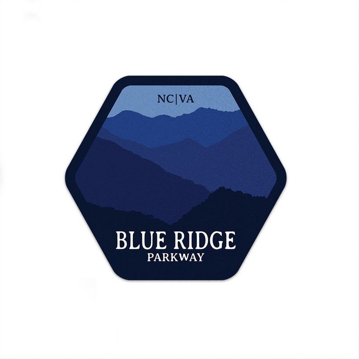 the blue ridge parkway sticker is shown in front of a white background with mountains