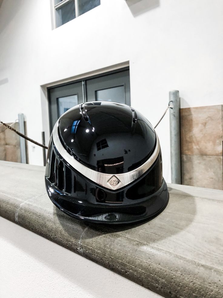 a motorcycle helmet sitting on top of a counter