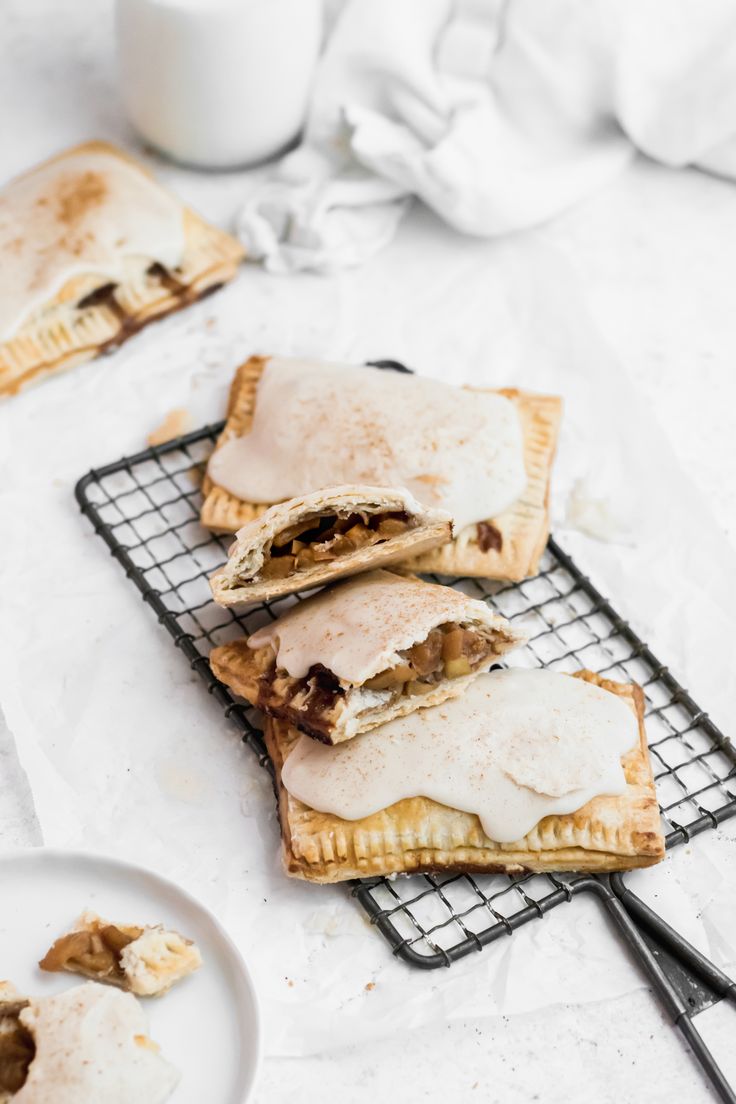 three pastries sitting on top of a cooling rack