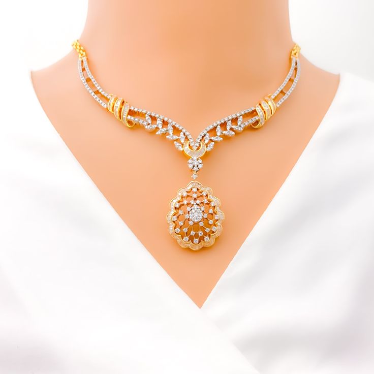 This exquisite 18k gold set, weighing 46.8 grams, features an extravagant floral vine design adorned with dazzling diamonds. The yellow gold finish enhances its luxurious appeal, making it perfect for any special occasion. The set includes a necklace with a total diamond weight of 8.16 carats, featuring F-G color and VS quality diamonds in round and baguette shapes. The necklace has a length of 16.5 inches with a 1.5-inch drop length, adjustable 0.75-inch links, and a secure hook lock. The match Elegant Gold Plated Bridal Necklace, Elegant Gold-plated Bridal Necklace, Gold Bridal Necklace With Elegant Design, Elegant Gold Bridal Necklace, Opulent Formal Necklace With Elegant Design, Elegant Yellow Gold Necklaces For Celebrations, Elegant Yellow Gold Necklace For Celebration, Elegant Yellow Gold Bridal Necklace, Luxury Filigree Diamond Necklace For Formal Occasions