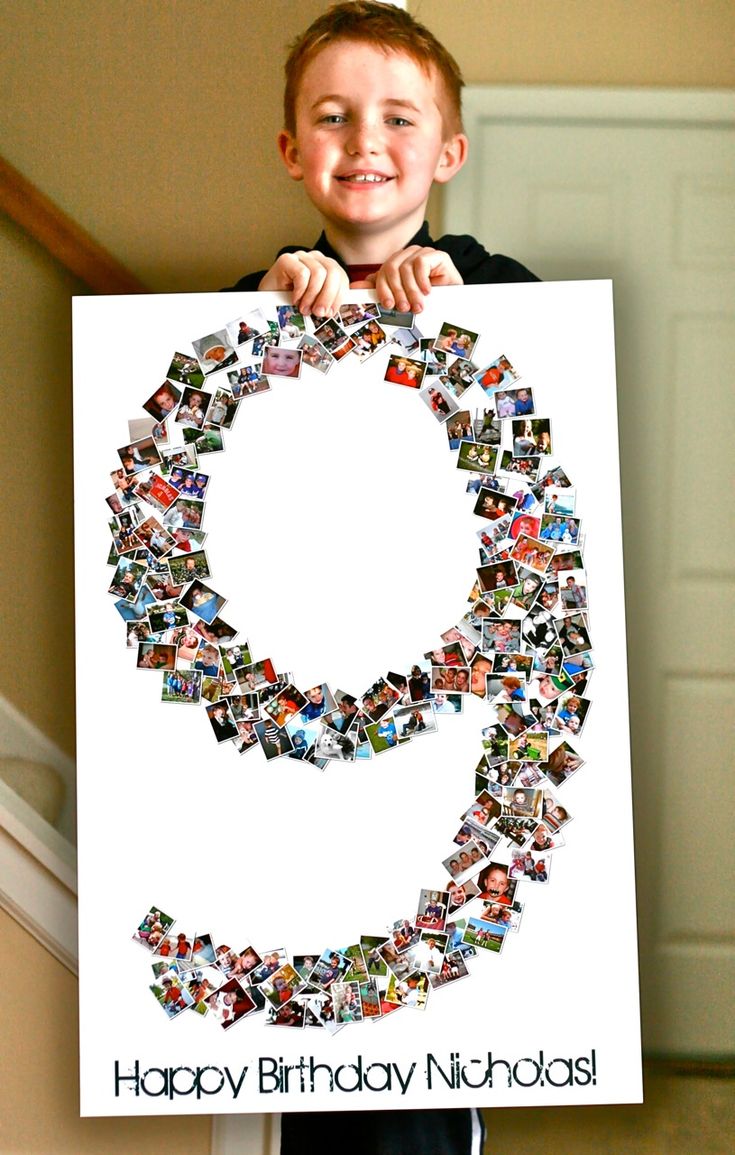 a young boy holding up a birthday card with the number nine made out of photos