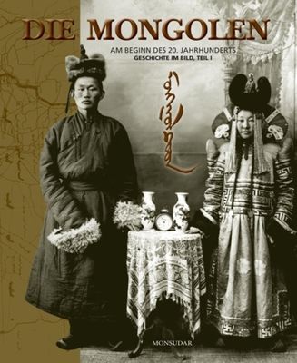 two women standing next to each other in front of a sign that says die mongolen