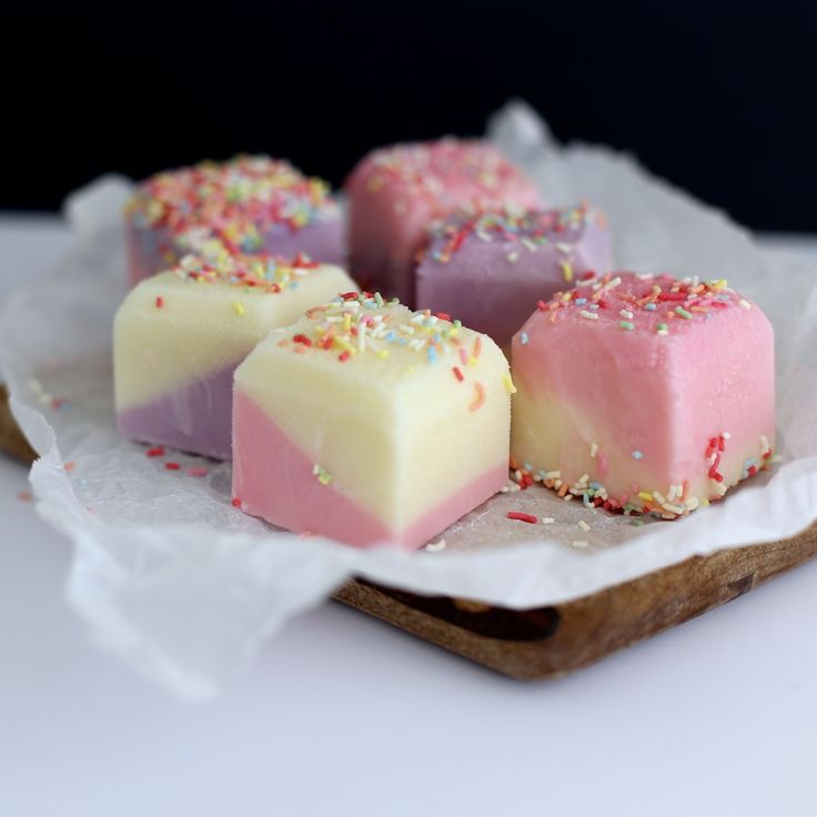 four pieces of ice cream birthday squares on a tray