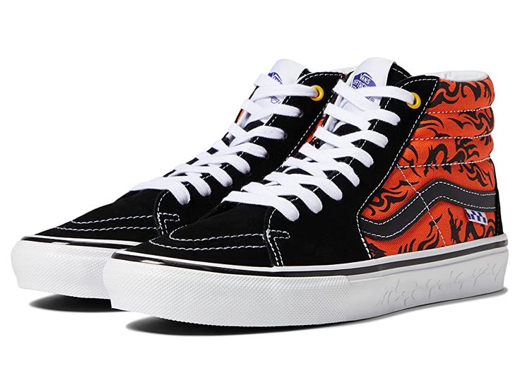 Vans Skate SK8-Hi(r) - Men's Shoes : Dragon Flame Black/Orange : Step that shoe game up a notch and skateboard with confidence in the Vans Skate SK8-Hi. These Vans are subtle but make a cool statement as they pair well with just about anything in the wardrobe. Grab that board and make incredible moves in style as these shoes also provide great support for the feet, allowing maximum performance. Cushioning and impact protection helps lessen leg fatigue for longer skate sessions. New molded heel c Vans Skate Hi, Tattooed People, Dragon Flame, Long Skate, Skate Man, Vans Skate, Men's Vans, Vans Off The Wall, Vans High Top Sneaker