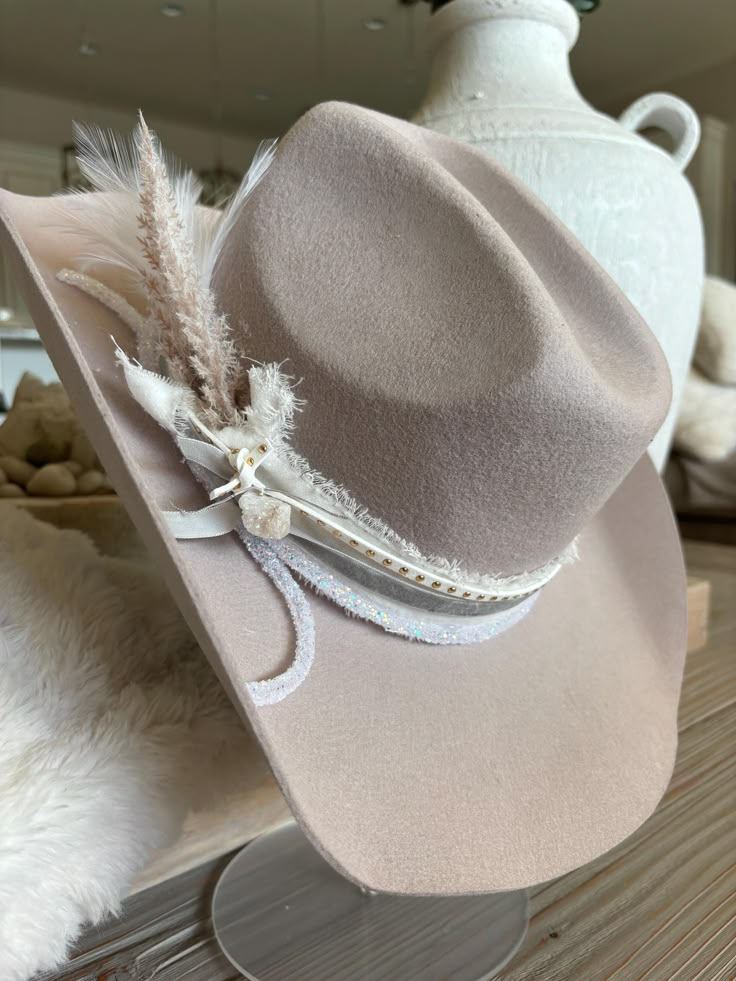 Women's cowboy hat  Boots not included  Decorative wool cowboy hat.  Geo quarts charm attached One size fits most  56-58  Adorable   All sales final. Birthday girl, bride to be, bachelorette fun.  Need a different color ? Message me. light gray  hat, gold , whites and creams and silvers Colored Cowboy Hats, Cowgirl Hat Inspo Diy, Bride Cowboy Hat, Bridal Hats, Bride Cowgirl Hat, Cowboy Hats For Women, Cream Brimmed Hat For Western-themed Events, White Costume Hat For Western-themed Events, Cowgirl Hat Cream