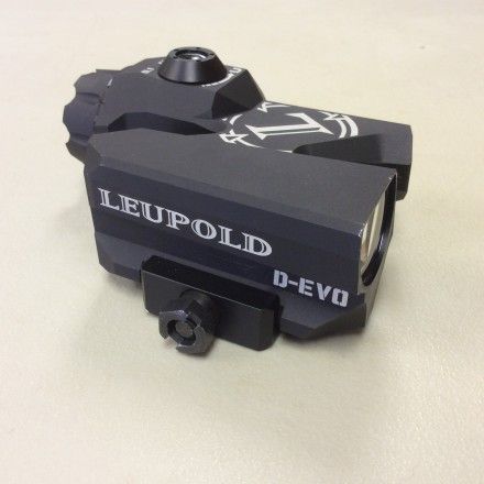 a close up of a camera on a white surface with the words leupold d - ev