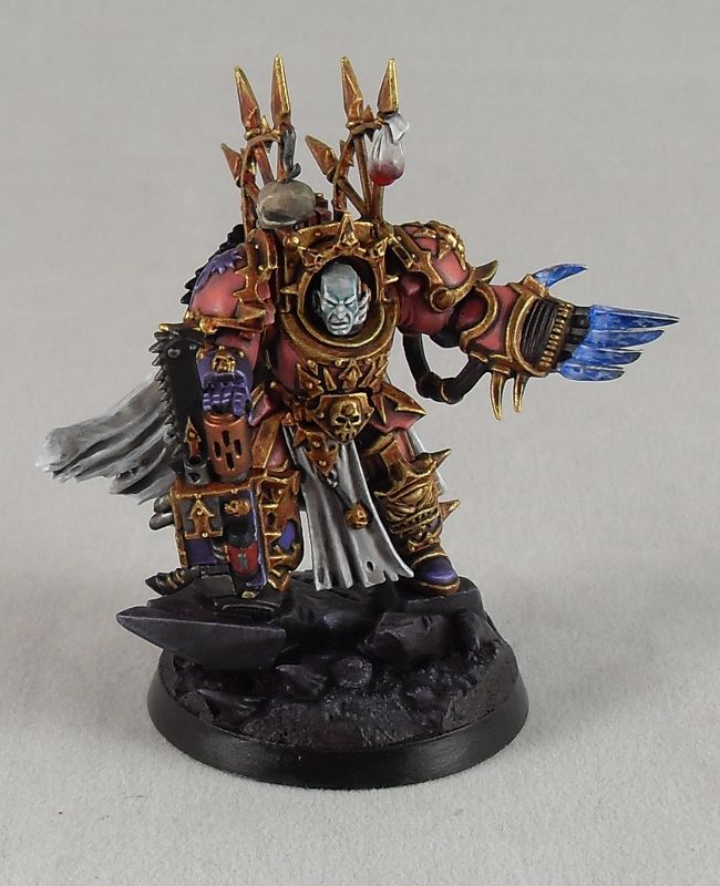 a painted warhammer with wings and armor