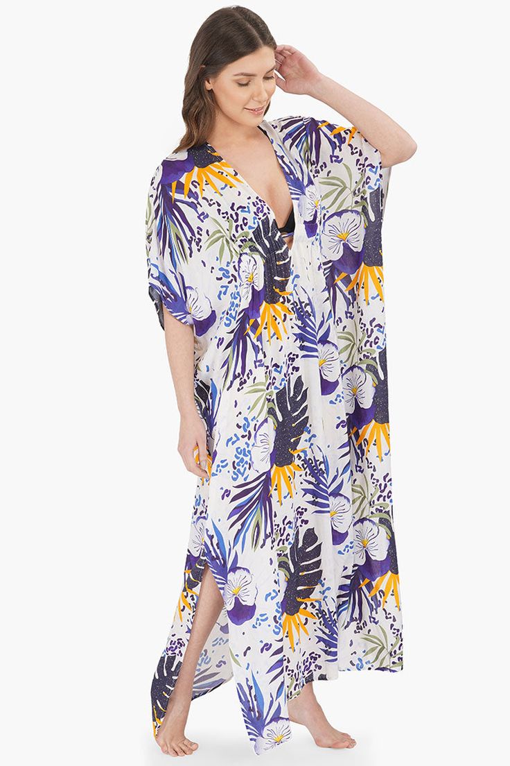 Kaftan Dress V-neckline Drawstring tie at waist Blue tropical print all over Loose and comfortable fit Made in soft viscose fabric Let the sun shine, let the flowers bloom, let the rainbow gleam through! None of it can hold a candle to our beautiful tropical twilight cover up.Is it time for the vacay you have been waiting for since ages. Bro Tip? Pack this sexy, comfy and sassy kaftan and you're set to take the flight off!Pair this piece with an adorable pair of slip-on sandals and the chicest s Twilight Cover, Leopard Bag, Sun Shine, Vacation Looks, Flowers Bloom, Kaftan Dress, Viscose Fabric, Bag Dress, Tropical Print