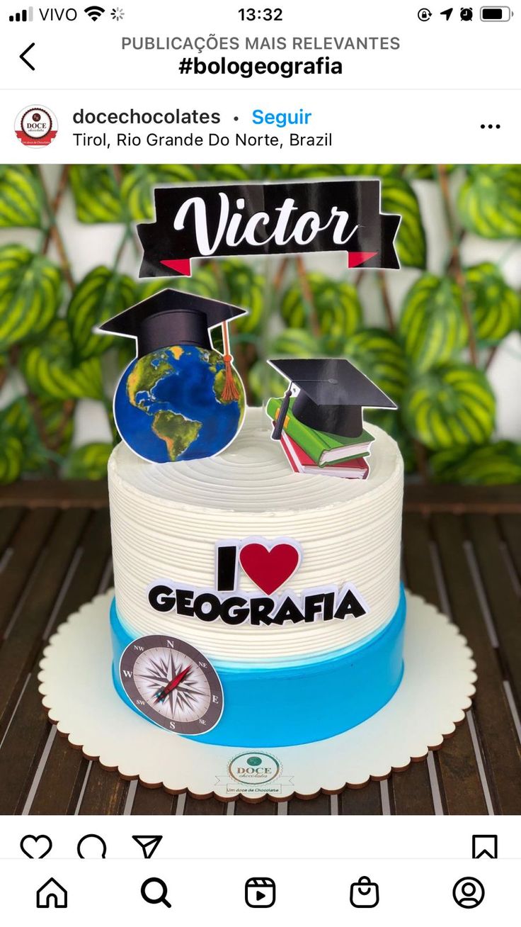 a cake that has been decorated to look like a graduation cap and diploma on top