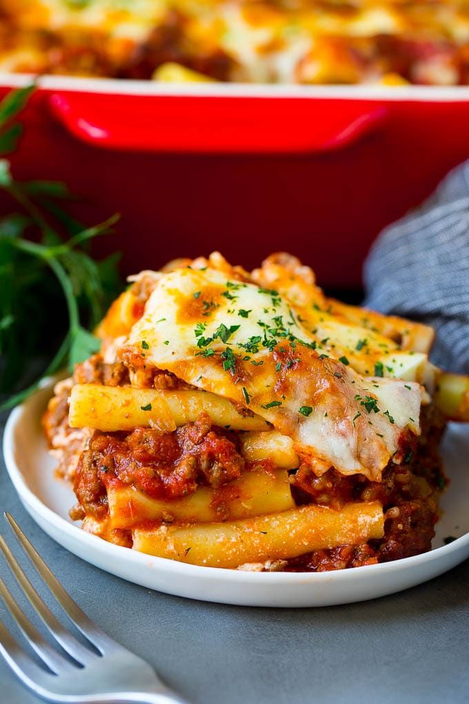 A serving of baked ziti with meat sauce and ricotta cheese. | Ziti