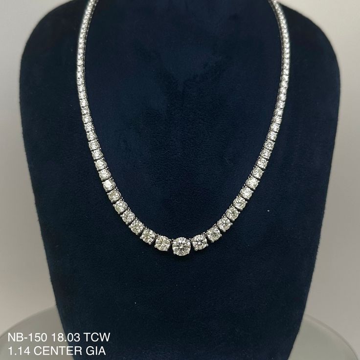 This 18.03 Cts. Natural Round Riviera Necklace boasts a unique combination of elegance and sophistication with its 18K white gold construction and a stunning round-cut center diamond. It is the perfect piece to elevate any look. Get ready to make a statement with this luxurious necklace. CENTER 1.14 RD J VS1 GIA 2457564225SIDE 0.60 RD J VS2 GIA 5453358981 & 0.60 J VS2 RD GIA 5453445943DIAMOND 15.69 RD TCW 112 PCS. H-J VS1-VS218K WG 22.84 GRAMS SIZE 16.50" NB-150 White Gold Necklaces With Brilliant Cut In Platinum, White Gold Platinum Necklace With Brilliant Cut, Formal White Gold Solitaire Necklace With Brilliant Cut, Classic Formal Tennis Necklace With Lab Grown Diamonds, Classic Formal Tennis Necklace With Lab-grown Diamonds, Formal White Gold Platinum Necklace, Luxury Platinum Necklace With Diamond Cut, Formal White Gold Lab Grown Diamond Solitaire Necklace, Luxury Diamond Necklace With Brilliant Cut For Formal Events