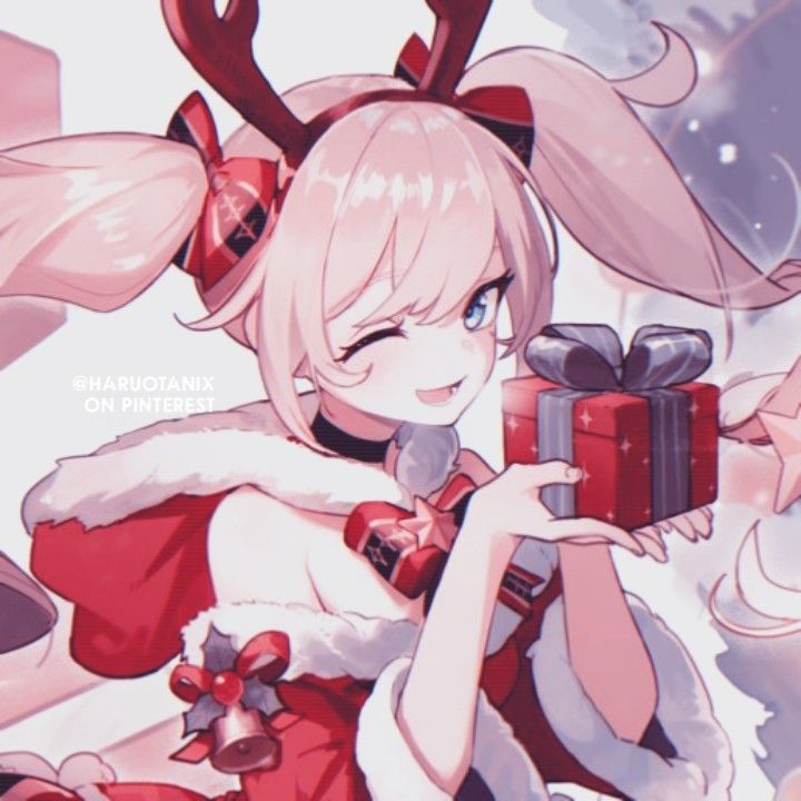 an anime character is holding a present in front of her face and wearing reindeer ears