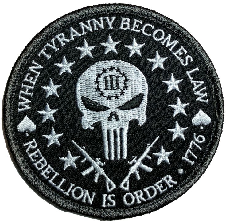 a black and white patch with the words, when tyanny becomes law rebellion is order