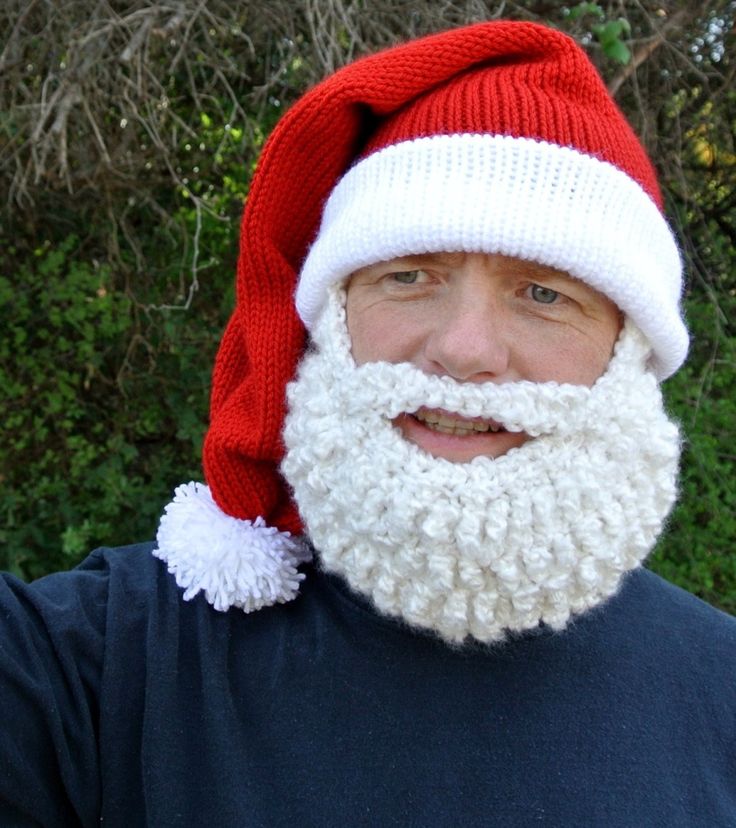 a man wearing a santa hat and beard