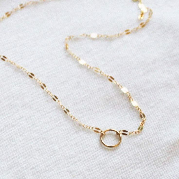 One of our best selling dainty necklaces! This mini eternity necklace is edgy and chic, wear it in gold or silver. A reminder that some things do last forever! -10mm open circle -14kt Gold-Filled or sterling silver chain & circle. -Choose fancy, link, drawn, satellite or bar link chain -Water Friendly Minimalist Circle Cable Chain Jewelry, Dainty Clavicle Chain With Open Circle Pendant, Dainty Open Circle Clavicle Chain Jewelry, Minimalist Chain Necklace With Round Pendant For Everyday, Everyday 14k Gold Filled Chain Necklace With Round Pendant, Dainty Jewelry With Delicate Open Circle Chain, Dainty Open Circle Jewelry With Delicate Chain, Minimalist Round Pendant Chain Necklace For Everyday, Dainty Delicate Chain Jewelry