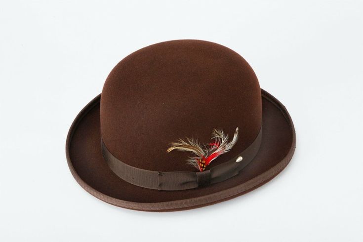 This is a brand new men's derby bowler hat. It is a beautiful brown color, and was constructed with an attention to detail. It includes a satin lining and the stylish addition of a (removable) feather to the brim. This bowler hat is constructed from high quality 100% wool, keeping you both stylish and comfortable year round. Mens Derby Hats, Easy Experiments, Brown Derby, Colored Hair Tips, Random Gif, Baby Tiger, Bowler Hat, Fluid Acrylic Painting, Kentucky Derby Hat