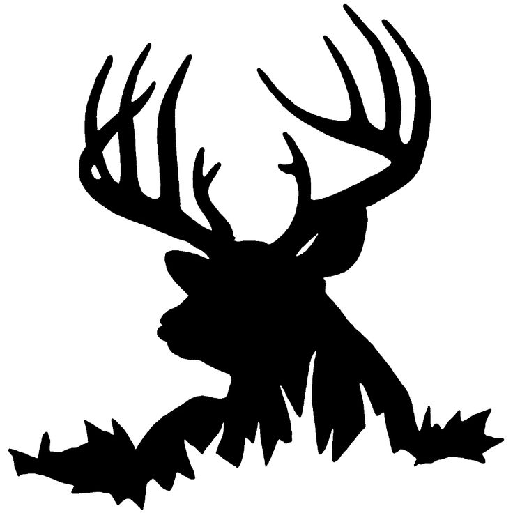 the silhouette of a deer with antlers on it's back legs and large horns