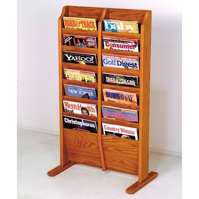 a wooden magazine rack with magazines on it