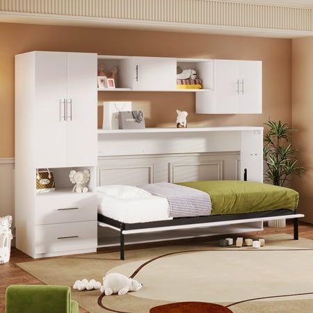 a bedroom with a bed, dresser and bookcases in the middle of it