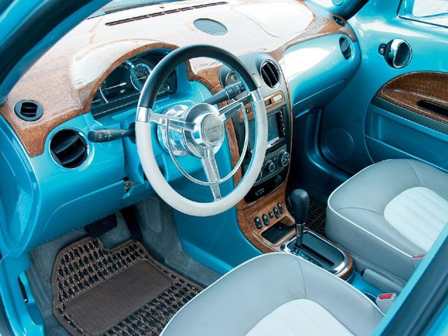 the interior of an old car with blue paint