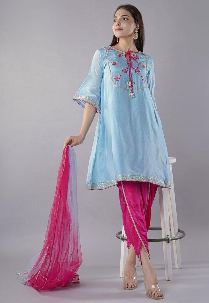 Readymade Art Uppada Silk A Line Suit in Sky Blue Color. This attire with Cotton Lining is Enhanced with Resham, Zari, Beads and Lace Border Work. Crafted in Round Neck and Half Sleeve. Available with an Art Uppada Silk Dhoti in Pink and a Net Dupatta in Shaded Pink and Sky Blue Color. The Kameez and Bottom Lengths are 34 and 38 inches respectively.   Do note: 1.)Accessories shown in the image are for presentation purposes only and length may vary upto 2 inches. 2.)Slight variation in actual col Blue Embroidered Cotton Palazzo Set, Embroidered Cotton Blue Palazzo Set, Embroidered Blue Cotton Palazzo Set, Blue Floral Embroidered Palazzo Set For Festivals, Traditional Drape Blue Set With Floral Embroidery, Blue Floral Embroidered Straight Kurta, Blue Sharara With Floral Embroidery In Traditional Drape, Blue Straight Kurta With Floral Embroidery, Blue Sharara With Floral Embroidery And Traditional Drape