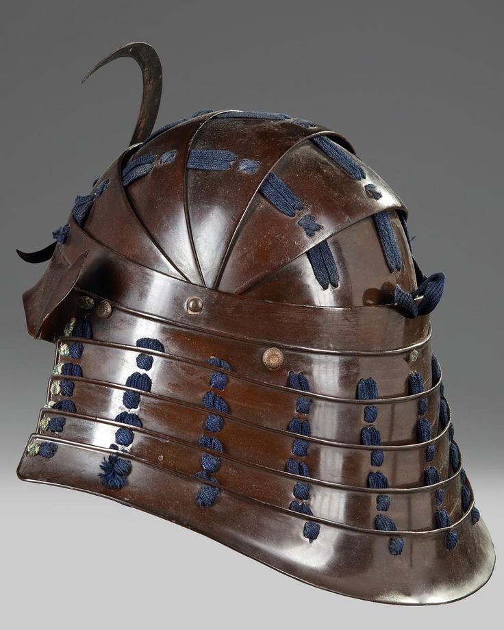 a helmet with horns and spikes on it