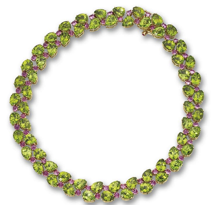 PERIDOT AND PINK SAPPHIRE NECKLACE. The stylized leaf and berry motif set with numerous pear-shaped peridots weighing approximately 148.00 carats and round pink sapphires weighing approximately 21.00 carats, mounted in 18 karat gold, length 16 inches. Pink Sapphire Necklace, Peridot Rings, Stylized Leaf, Titanic Jewelry, Diamond Heart Pendant Necklace, Handcrafted Silver Jewelry, Silver Jewellery Online, Jewelry Designing, Peridot Jewelry