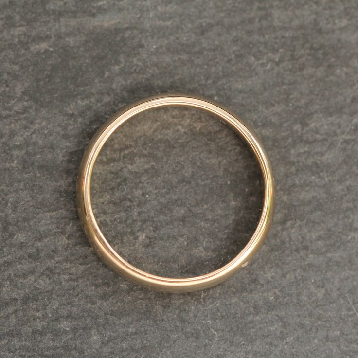 This 14k yellow gold heavy ring is a classic piece perfect for any jewelry collector! Worn with multiple bands it gives some great depth and also makes for a perfect wedding ring! ⊹ Vintage 14K Yellow gold⊹ Stamp reads 14K⊹ Excellent vintage pre-owned condition⊹ Ring Size: 7.5⊹ Width: 3.9mm Timeless Thick Band Wedding Ring, Heirloom Yellow Gold Stackable Rings For Anniversary, Heirloom Style Yellow Gold Stackable Rings For Anniversary, Heirloom Yellow Gold Stackable Anniversary Rings, Gold Rings Stamped 14k, 14k Yellow Gold Dome Ring, Timeless Gold Wide Band Stackable Ring, Timeless Gold Stackable Wide Band Ring, Classic Wide Band Stackable Wedding Rings