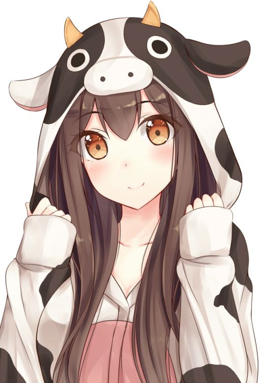 a girl with long hair wearing a cow hat and holding her hand up to her ear