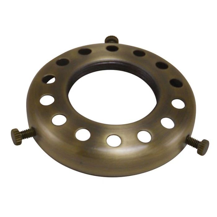 a metal ring with holes on the side and screws at the center, in an industrial style