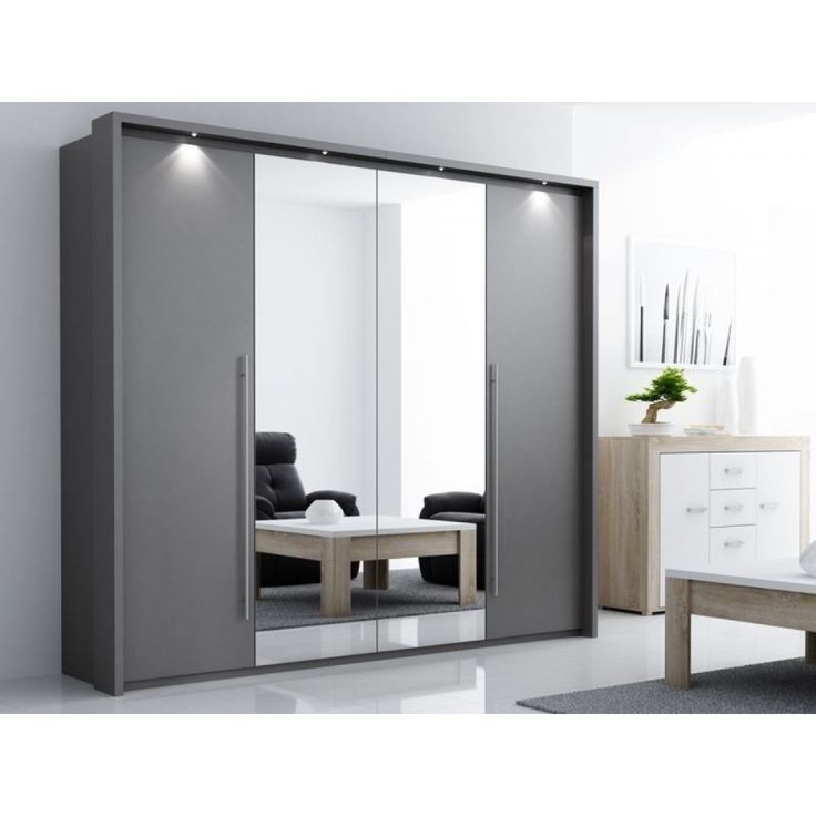 an image of a modern bedroom setting with mirrored closet doors in grey and white colors