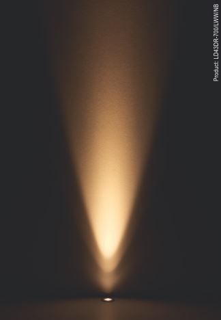 an image of a light shining in the dark