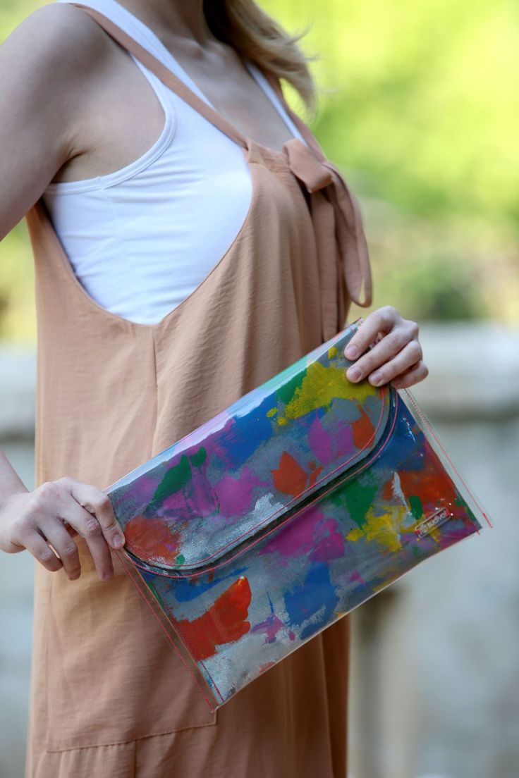 Hand Painted Clutch Purse Are you ready to meet the special designed bags of Sudivo? Sudivo aims to bring art to all aspects of life! With wearable art products that have elegant designs, we are breaking free from the familiar rules of colors, patterns and abstract artwork. Using this style we continue to move forward and , through our bags, make it possible for everyone to connect with art. Our Sudivo bags, that write their own stories, are manufactured entirely with hand dye, and we transform Multicolor Envelope Bag For Everyday Use, Multicolor Handheld Pouch For Daily Use, Multicolor Handheld Clutch With Removable Pouch, Handheld Multicolor Clutch With Removable Pouch, Multicolor Tote Pouch For Travel, Multicolor Shoulder Bag Pouch For Everyday Use, Multicolor Travel Tote Pouch, Multicolor Rectangular Clutch For Travel, Multicolor Rectangular Travel Clutch