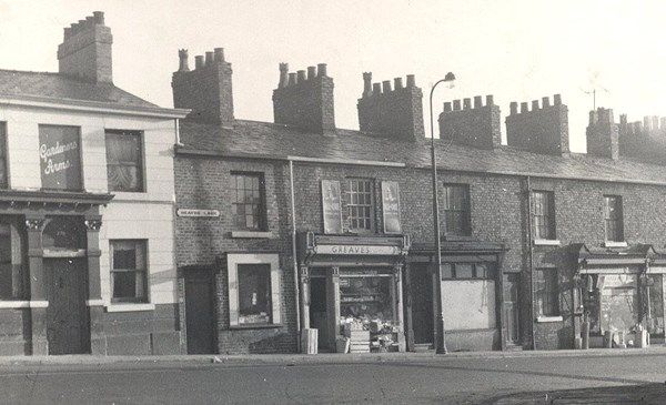 an old black and white photo of some buildings