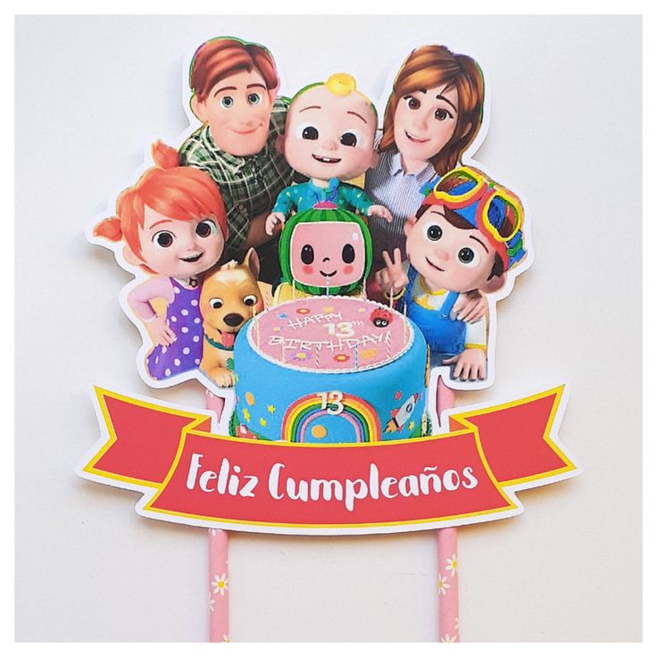 there is a birthday cake with the characters on it and a banner that says feliz cumpleanos