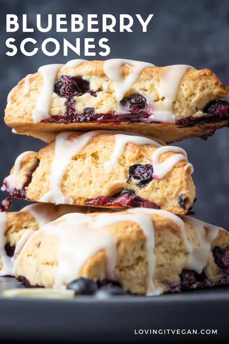 three blueberry scones stacked on top of each other