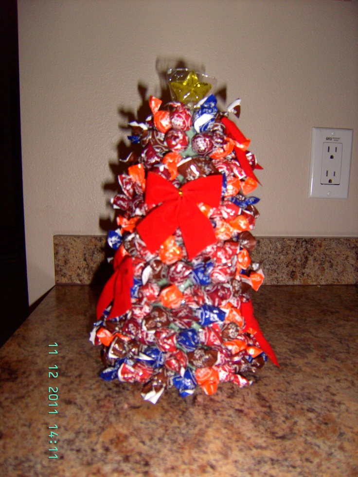 a christmas tree made out of candy bars