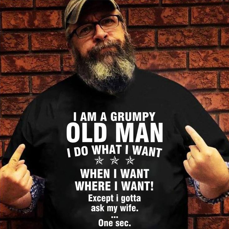 a man with a long beard wearing a t - shirt that says i am a grumpy old man