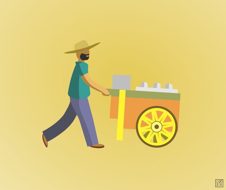 a man pushing a cart with ice cream on it's wheels and holding the handle