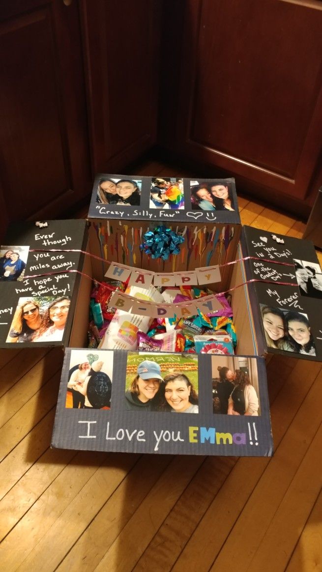 an open box with pictures and writing on the inside that says i love you emo