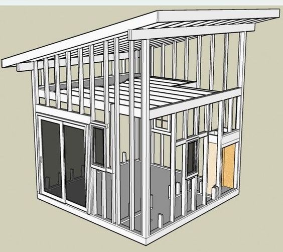 an image of a small house that is in the process of being built with plans