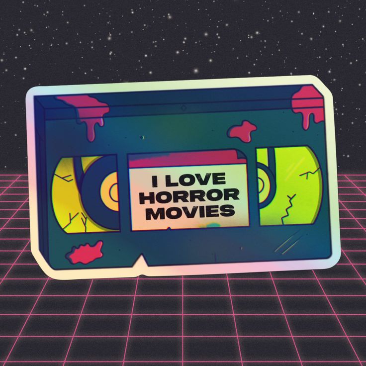 i love horror movies sticker on an old school computer screen with space in the background