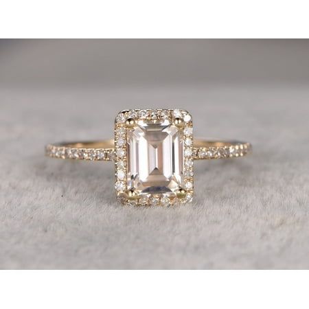 Best Emerald Cut Moissanite is made of 1.25 Ct Halo Moissanite & Moissanite Diamond Wedding Ring in 925 Silver with Rose Gold Plating. The crafted in superb semi-eternity style ring has .25 carat of real natural Moissanite Diamonds. The center stone is of 1.25 carats of real Moissanite. Lets feature this ring in the engagement ring trends of 2019. Size: 5.0.  Color: Yellow.  Gender: female.  Age Group: adult. Diamond Ring With Emerald, Ring With Emerald, Trending Engagement Rings, Emerald Cut Engagement, Ring Trends, Emerald Cut Moissanite, Moissanite Diamond Rings, Emerald Engagement Ring Cut, Gold Halo