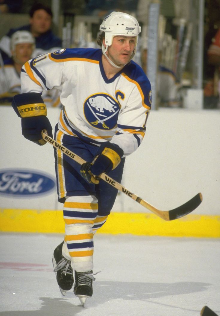 an image of a man playing hockey on the ice