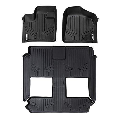 black floor mats for the front and rear of a car, with three pieces missing