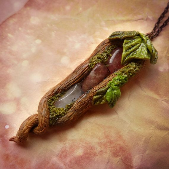 a piece of food that is sitting on a table with some kind of chain attached to it