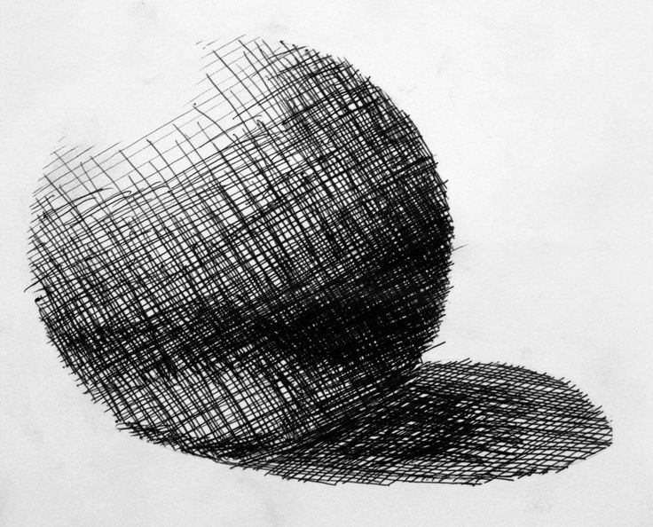 a black and white drawing of a round object on a sheet of paper that has been drawn