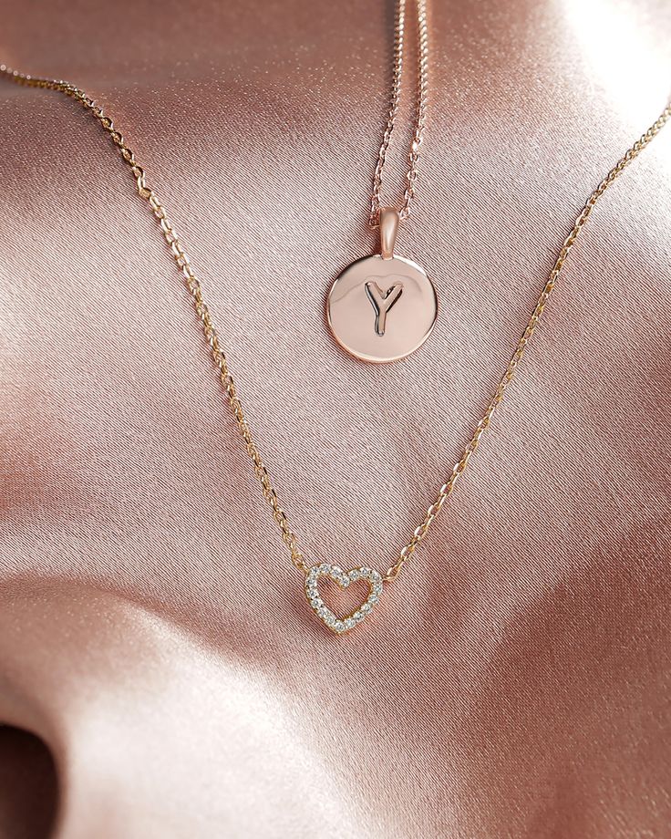 Our open heart pendant is a timeless expression of love. It’s the sweetest gift for yourself or for someone you hold close to show them just how much you care for them. With sparkling cubic zirconia and a dainty chain, this piece is perfectly flirty and feminine. 14KT yellow, rose or white gold platedAAAAA Cubic ZirconiaMeasurements: Diameter: 8mm (.3”)Chain length: 18”+2” extender Expression Of Love, Open Heart Necklace, Dainty Chain, Sweet Gifts, Open Heart, Yellow Rose, Chain Lengths, Chain Length, Heart Necklace